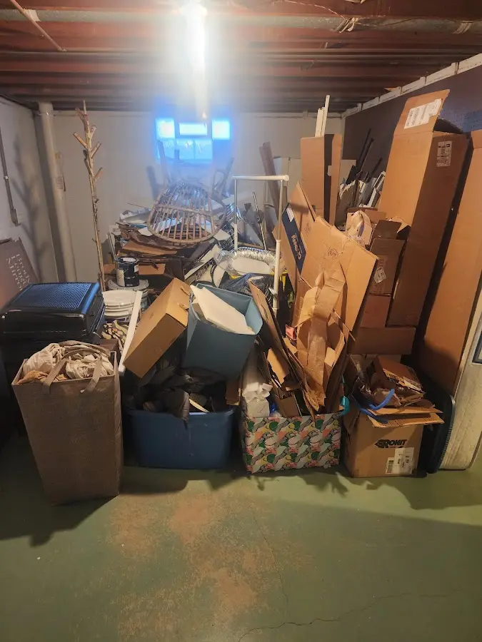 Roll-off dumpster container at job site for 2 Yard Dumpster Rental in Hornsby Bend